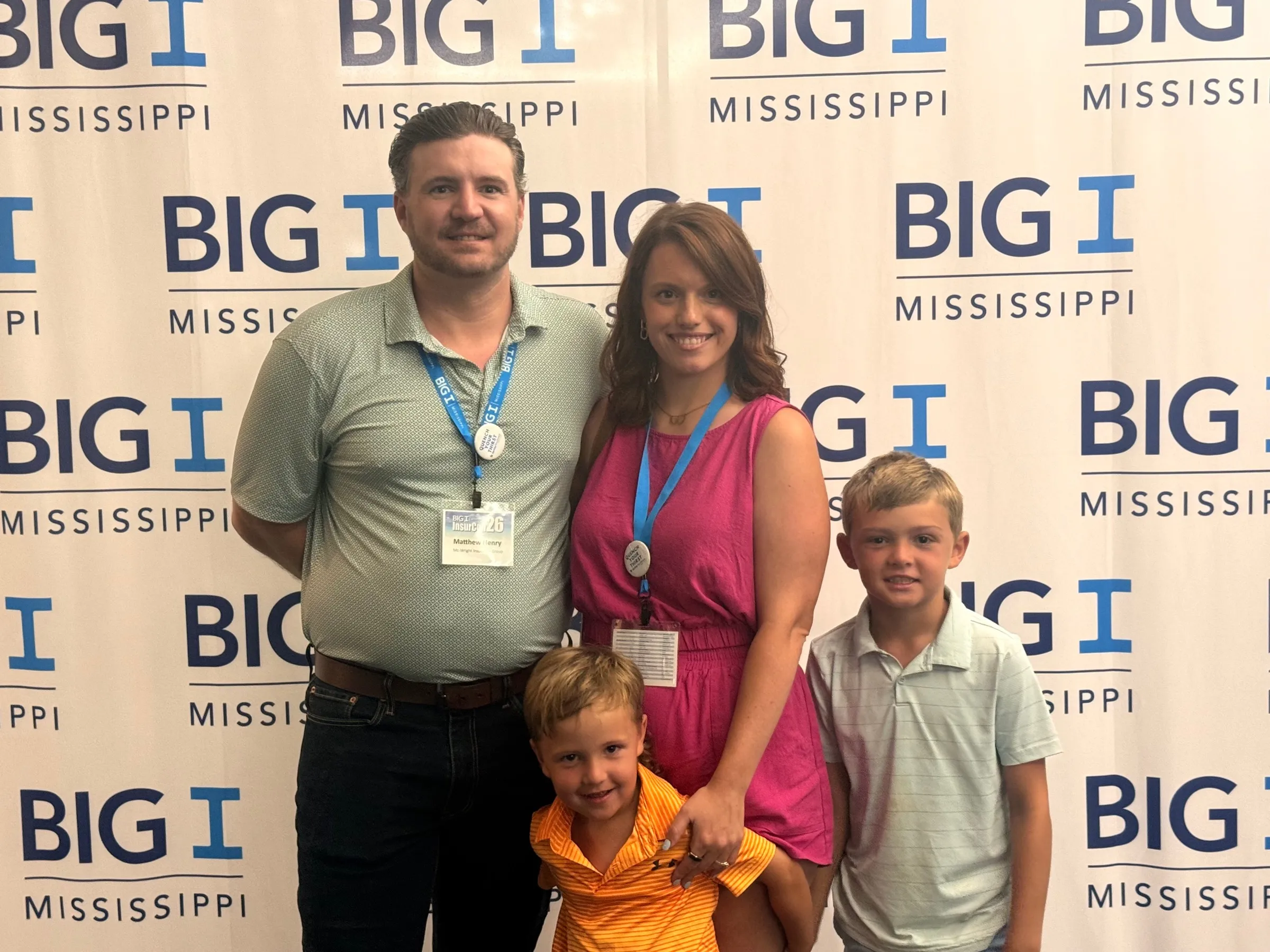 Matthew Henry with his wife and two sons at Big I Mississippi's InsurCon 2026