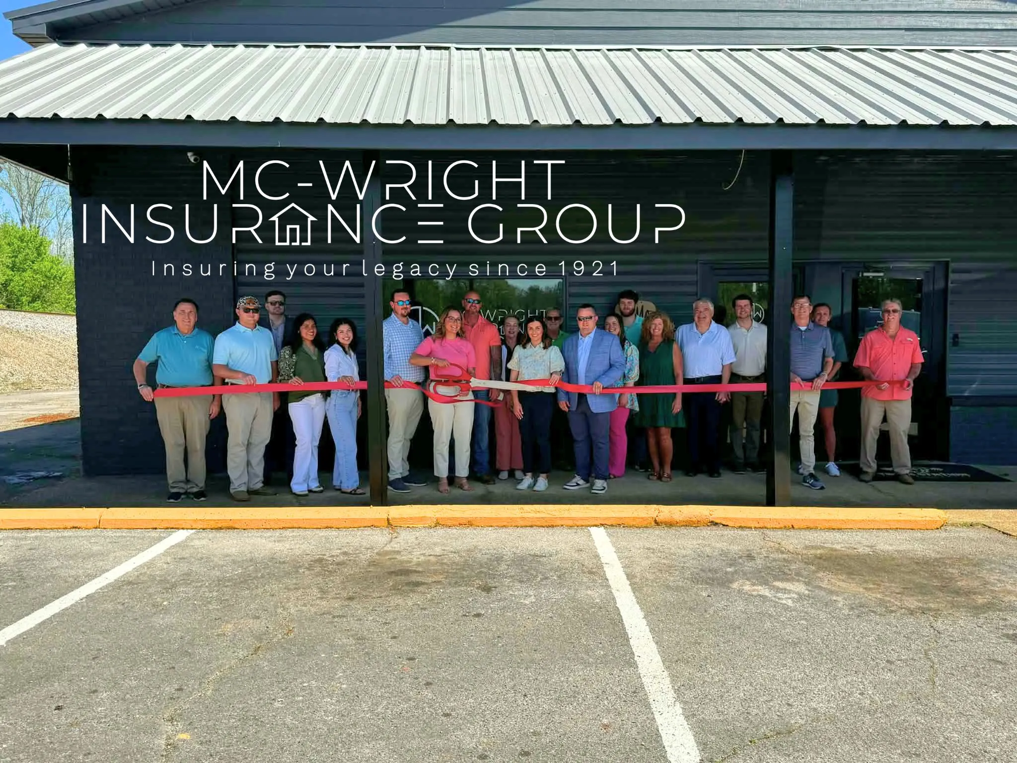 The McWright Insurance Group team at the ribbon cutting for their Iuka, Mississippi office